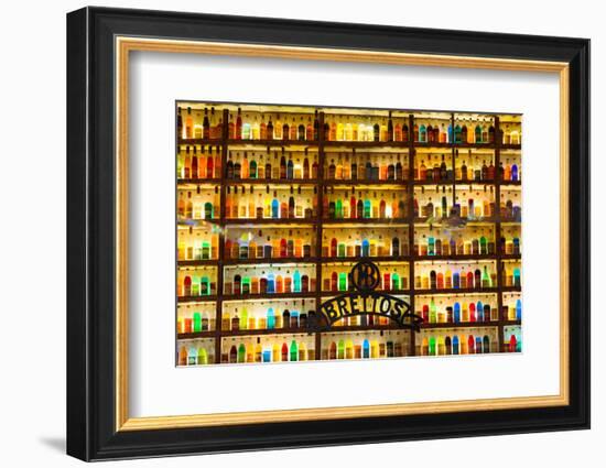 Athens, Attica, Greece. Wall of liquor and liqueur products available in the Brettos shop in the...-null-Framed Photographic Print