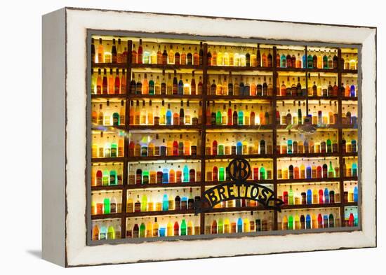 Athens, Attica, Greece. Wall of liquor and liqueur products available in the Brettos shop in the...-null-Framed Premier Image Canvas