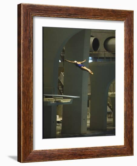 Athlete in Mid Air During a Platform Dive at Summer Olympics-Art Rickerby-Framed Photographic Print