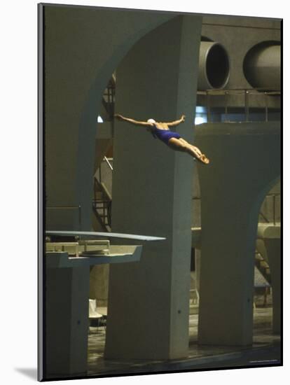 Athlete in Mid Air During a Platform Dive at Summer Olympics-Art Rickerby-Mounted Photographic Print