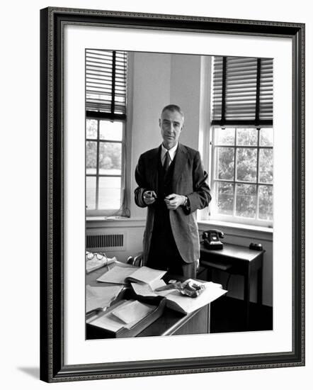 Atomic Scientist J. Robert Oppenheimer Standing in His Office after the Gray Report Was Published-Alfred Eisenstaedt-Framed Premium Photographic Print