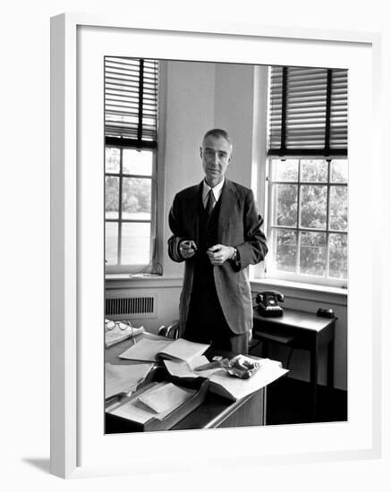 Atomic Scientist J. Robert Oppenheimer Standing in His Office after the Gray Report Was Published-Alfred Eisenstaedt-Framed Premium Photographic Print