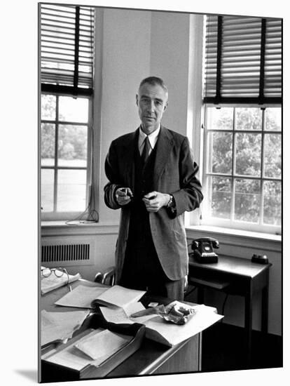 Atomic Scientist J. Robert Oppenheimer Standing in His Office after the Gray Report Was Published-Alfred Eisenstaedt-Mounted Premium Photographic Print