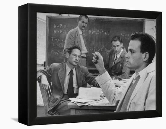 Atomic Scientists Discussing Subatomic Particles-Nat Farbman-Framed Premier Image Canvas