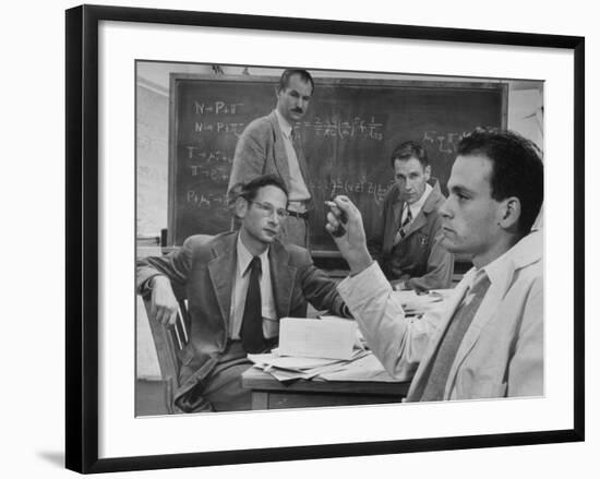 Atomic Scientists Discussing Subatomic Particles-Nat Farbman-Framed Premium Photographic Print