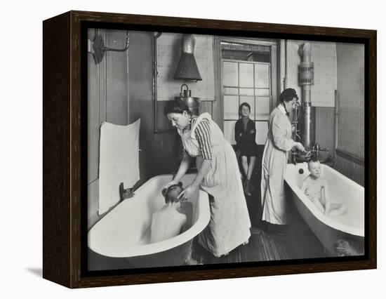 Attendants bathing boys at the Central Street Cleansing Station, London, 1914-Unknown-Framed Premier Image Canvas