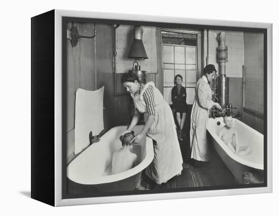 Attendants bathing boys at the Central Street Cleansing Station, London, 1914-Unknown-Framed Premier Image Canvas