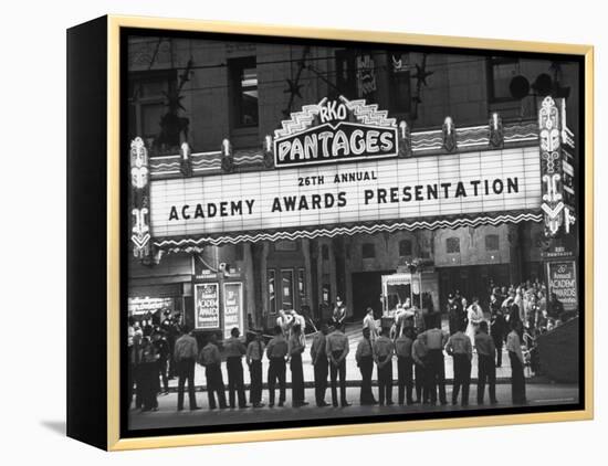 Attendants in Front of Pantages Theater Await Celebrities to Arrive for 26th Annual Academy Awards-George Silk-Framed Premier Image Canvas