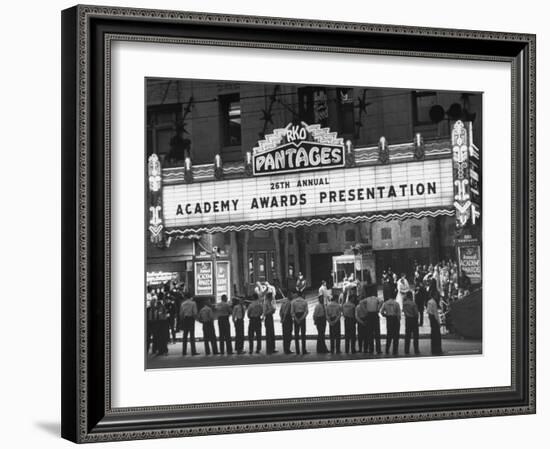 Attendants in Front of Pantages Theater Await Celebrities to Arrive for 26th Annual Academy Awards-George Silk-Framed Premium Photographic Print