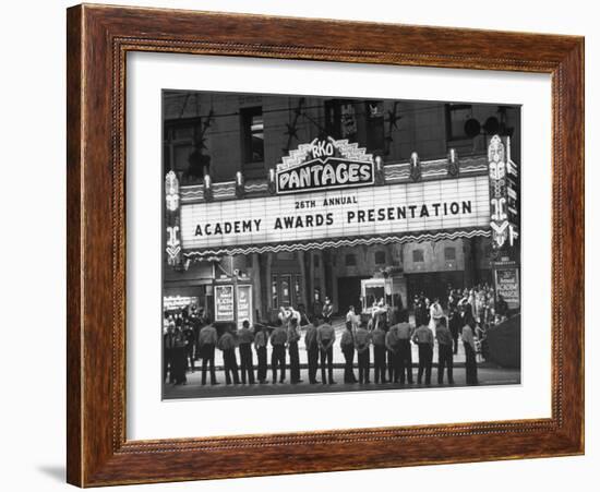 Attendants in Front of Pantages Theater Await Celebrities to Arrive for 26th Annual Academy Awards-George Silk-Framed Photographic Print