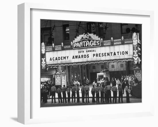 Attendants in Front of Pantages Theater Await Celebrities to Arrive for 26th Annual Academy Awards-George Silk-Framed Photographic Print