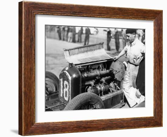 Attilio Marinoni, Chief Mechanic of Scuderia Ferrari, with an Alfa Romeo, 1934-null-Framed Premium Photographic Print