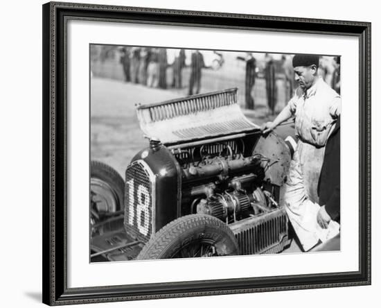 Attilio Marinoni, Chief Mechanic of Scuderia Ferrari, with an Alfa Romeo, 1934-null-Framed Photographic Print