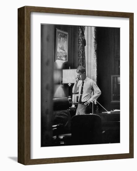 Attorney General Robert F. Kennedy, Talking on the Telephone in His Office-George Silk-Framed Photographic Print