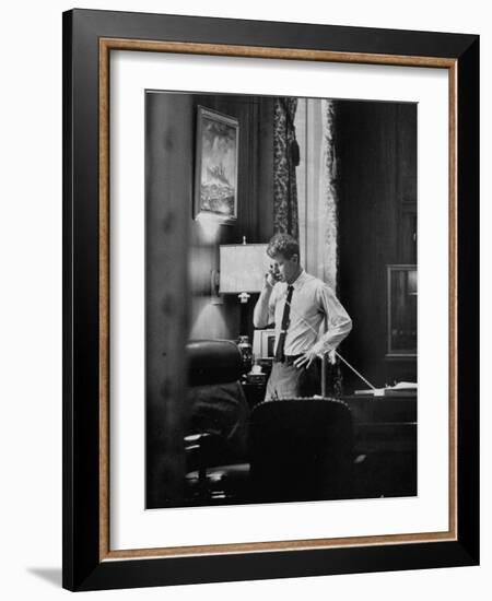 Attorney General Robert F. Kennedy, Talking on the Telephone in His Office-George Silk-Framed Photographic Print