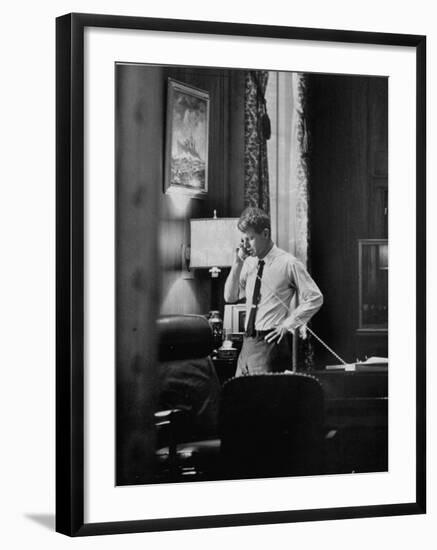 Attorney General Robert F. Kennedy, Talking on the Telephone in His Office-George Silk-Framed Photographic Print