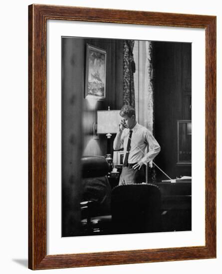 Attorney General Robert F. Kennedy, Talking on the Telephone in His Office-George Silk-Framed Photographic Print