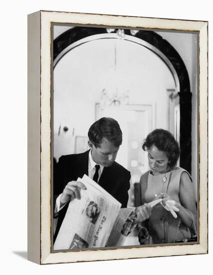 Attorney General Robert Kennedy and Wife Looking at Copy of the New York Times-George Silk-Framed Premier Image Canvas