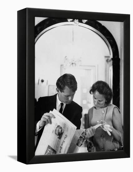 Attorney General Robert Kennedy and Wife Looking at Copy of the New York Times-George Silk-Framed Premier Image Canvas