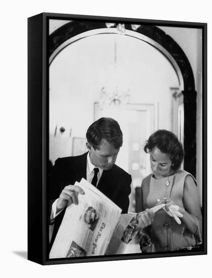 Attorney General Robert Kennedy and Wife Looking at Copy of the New York Times-George Silk-Framed Premier Image Canvas