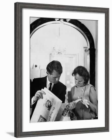 Attorney General Robert Kennedy and Wife Looking at Copy of the New York Times-George Silk-Framed Premium Photographic Print