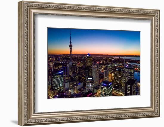 Auckland, New Zealand. The Auckland Skytower and harbor at night.-Micah Wright-Framed Photographic Print