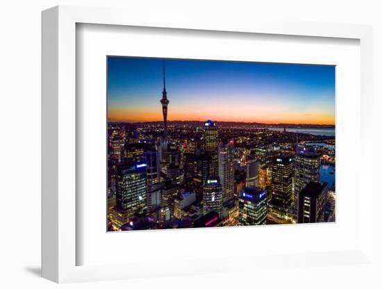 Auckland, New Zealand. The Auckland Skytower and harbor at night.-Micah Wright-Framed Photographic Print