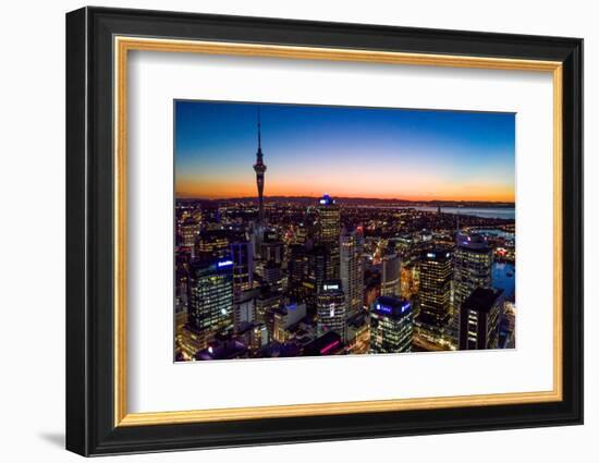 Auckland, New Zealand. The Auckland Skytower and harbor at night.-Micah Wright-Framed Photographic Print