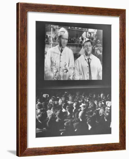 Audience at Omaha Theater Watching Abbott and Costello in Feature Picture "Who Done It"-Alfred Eisenstaedt-Framed Premium Photographic Print