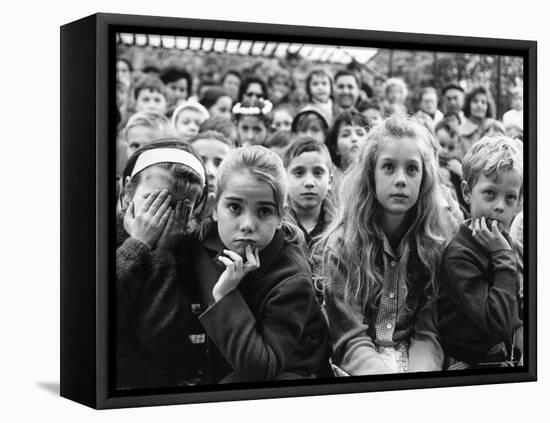 Audience of Children Sitting Very Still, with Rapt Expressions, Watching Puppet Show at Tuileries-Alfred Eisenstaedt-Framed Premier Image Canvas