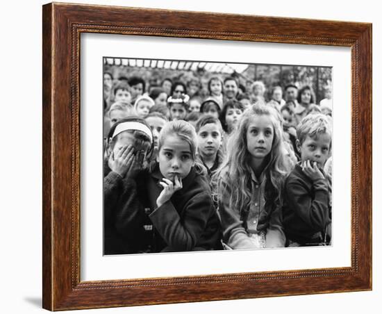 Audience of Children Sitting Very Still, with Rapt Expressions, Watching Puppet Show at Tuileries-Alfred Eisenstaedt-Framed Photographic Print