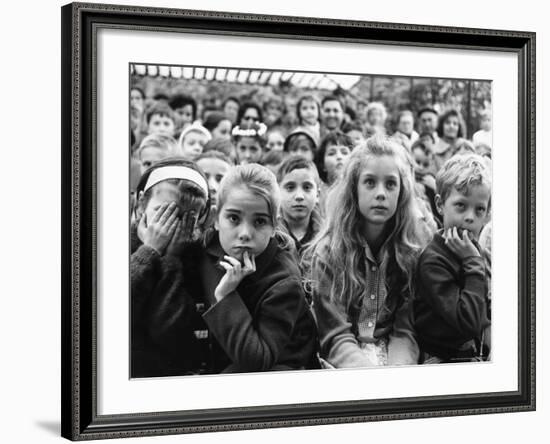 Audience of Children Sitting Very Still, with Rapt Expressions, Watching Puppet Show at Tuileries-Alfred Eisenstaedt-Framed Photographic Print