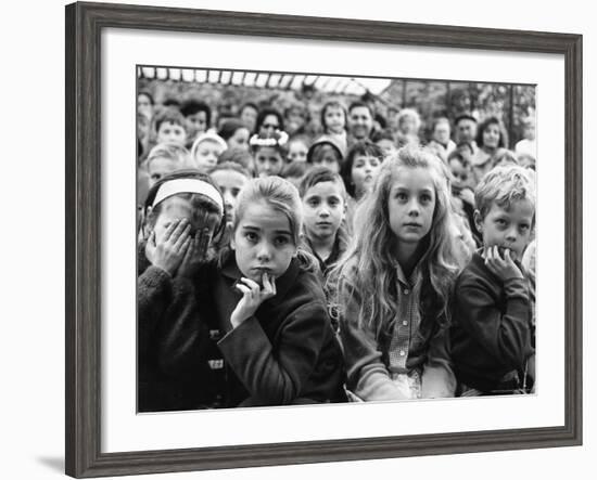 Audience of Children Sitting Very Still, with Rapt Expressions, Watching Puppet Show at Tuileries-Alfred Eisenstaedt-Framed Photographic Print
