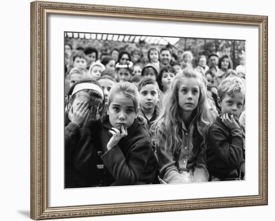Audience of Children Sitting Very Still, with Rapt Expressions, Watching Puppet Show at Tuileries-Alfred Eisenstaedt-Framed Photographic Print