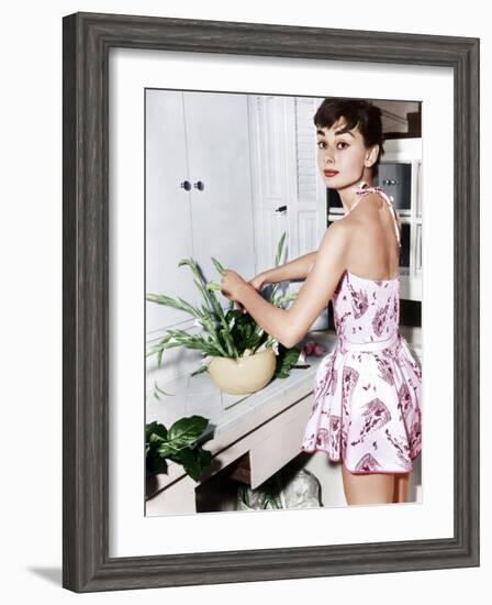 Audrey Hepburn Creates a Flower Arrangement, Ca. Early 1950s-null-Framed Photo