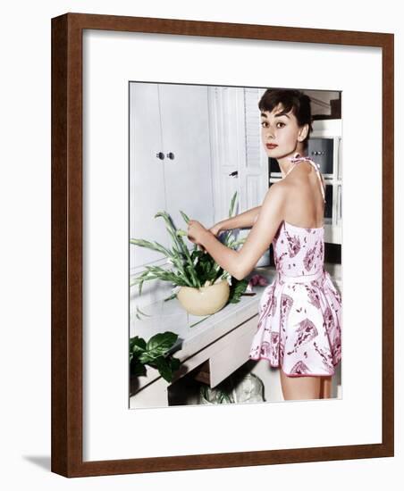 Audrey Hepburn Creates a Flower Arrangement, Ca. Early 1950s-null-Framed Photo