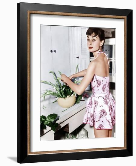 Audrey Hepburn Creates a Flower Arrangement, Ca. Early 1950s-null-Framed Photo