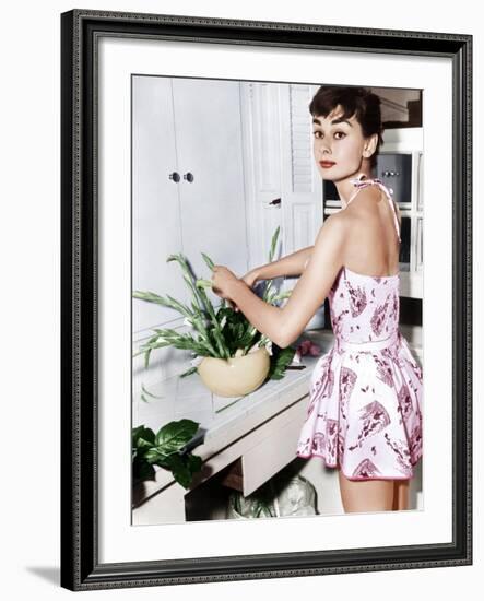 Audrey Hepburn Creates a Flower Arrangement, Ca. Early 1950s-null-Framed Photo