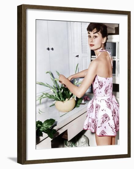 Audrey Hepburn Creates a Flower Arrangement, Ca. Early 1950s-null-Framed Photo