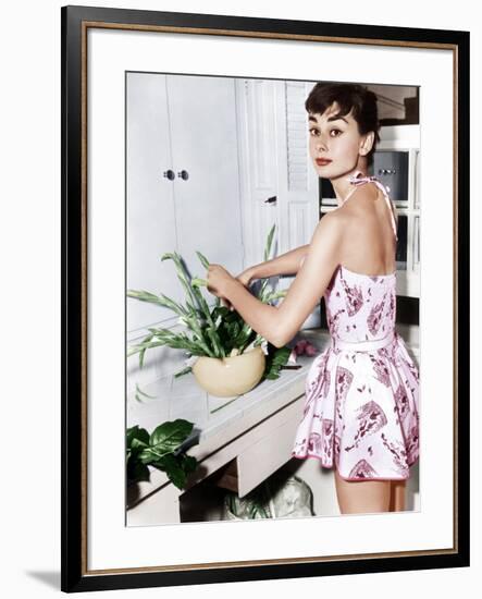 Audrey Hepburn Creates a Flower Arrangement, Ca. Early 1950s-null-Framed Photo