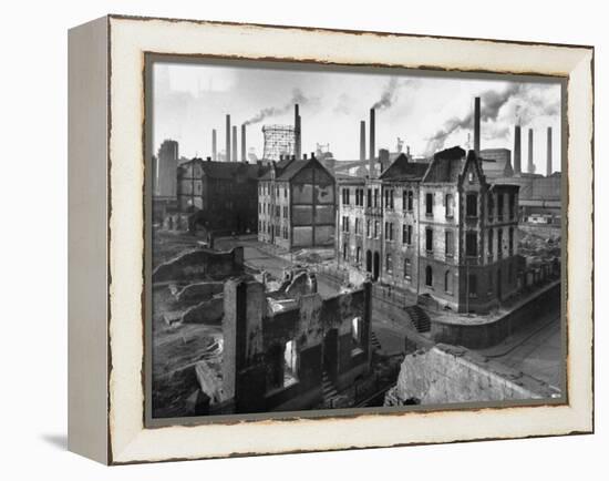 August Thyssen Steel Mill, Large Steel Works, Looming Smokily Behind Bomb-Ruined Town-Ralph Crane-Framed Premier Image Canvas