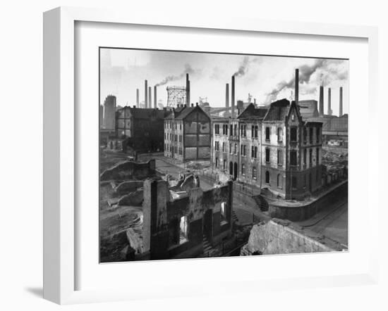 August Thyssen Steel Mill, Large Steel Works, Looming Smokily Behind Bomb-Ruined Town-Ralph Crane-Framed Photographic Print