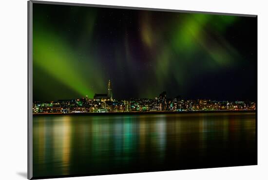 Aurora Borealis or Northern Lights over Reykjavik Skyline, Reykjavik, Iceland-null-Mounted Photographic Print