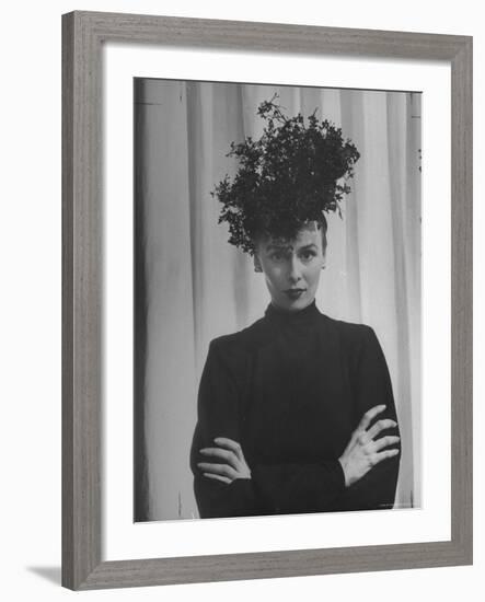 Austine Cassini Standing with Arms Crossed and Wearing Extravagant Hat-Marie Hansen-Framed Premium Photographic Print