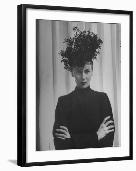 Austine Cassini Standing with Arms Crossed and Wearing Extravagant Hat-Marie Hansen-Framed Premium Photographic Print