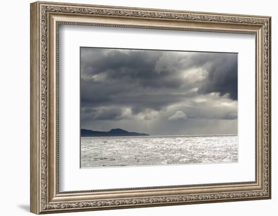 Australia, Tasmania, Tasman Sea. Dramatic line of sun on horizon through storm clouds and rain-Trish Drury-Framed Photographic Print