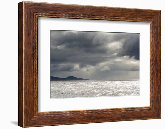 Australia, Tasmania, Tasman Sea. Dramatic line of sun on horizon through storm clouds and rain-Trish Drury-Framed Photographic Print