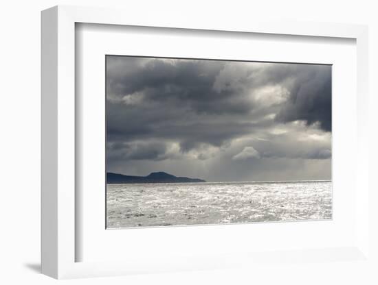 Australia, Tasmania, Tasman Sea. Dramatic line of sun on horizon through storm clouds and rain-Trish Drury-Framed Photographic Print