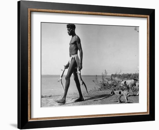 Australian Aborigine Man Bringing Back Two Monitor Lizards Known as Goannas to His Clan-Fritz Goro-Framed Photographic Print