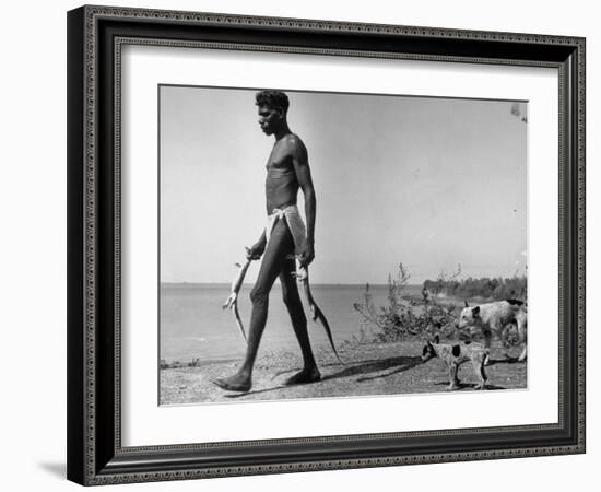 Australian Aborigine Man Bringing Back Two Monitor Lizards Known as Goannas to His Clan-Fritz Goro-Framed Photographic Print